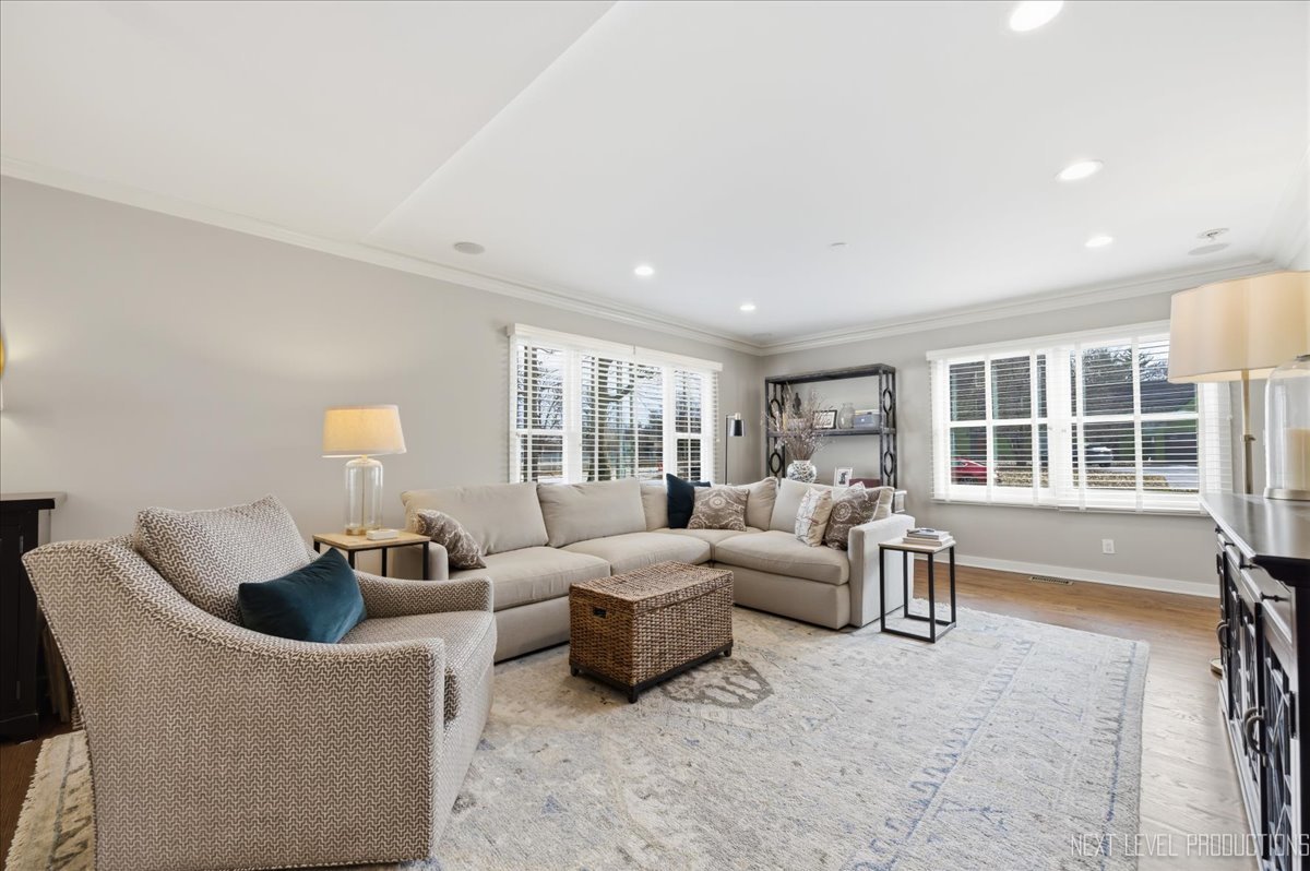 629 Peck Road Geneva, IL 60134 - Photo 15 of 38 a living room with furniture and a large window