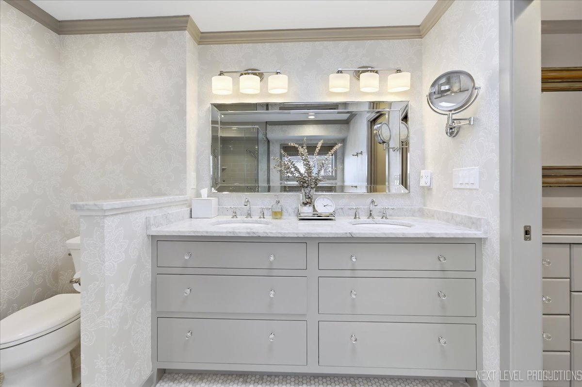 629 Peck Road Geneva, IL 60134 - Photo 20 of 38 a bathroom with a sink and a mirror