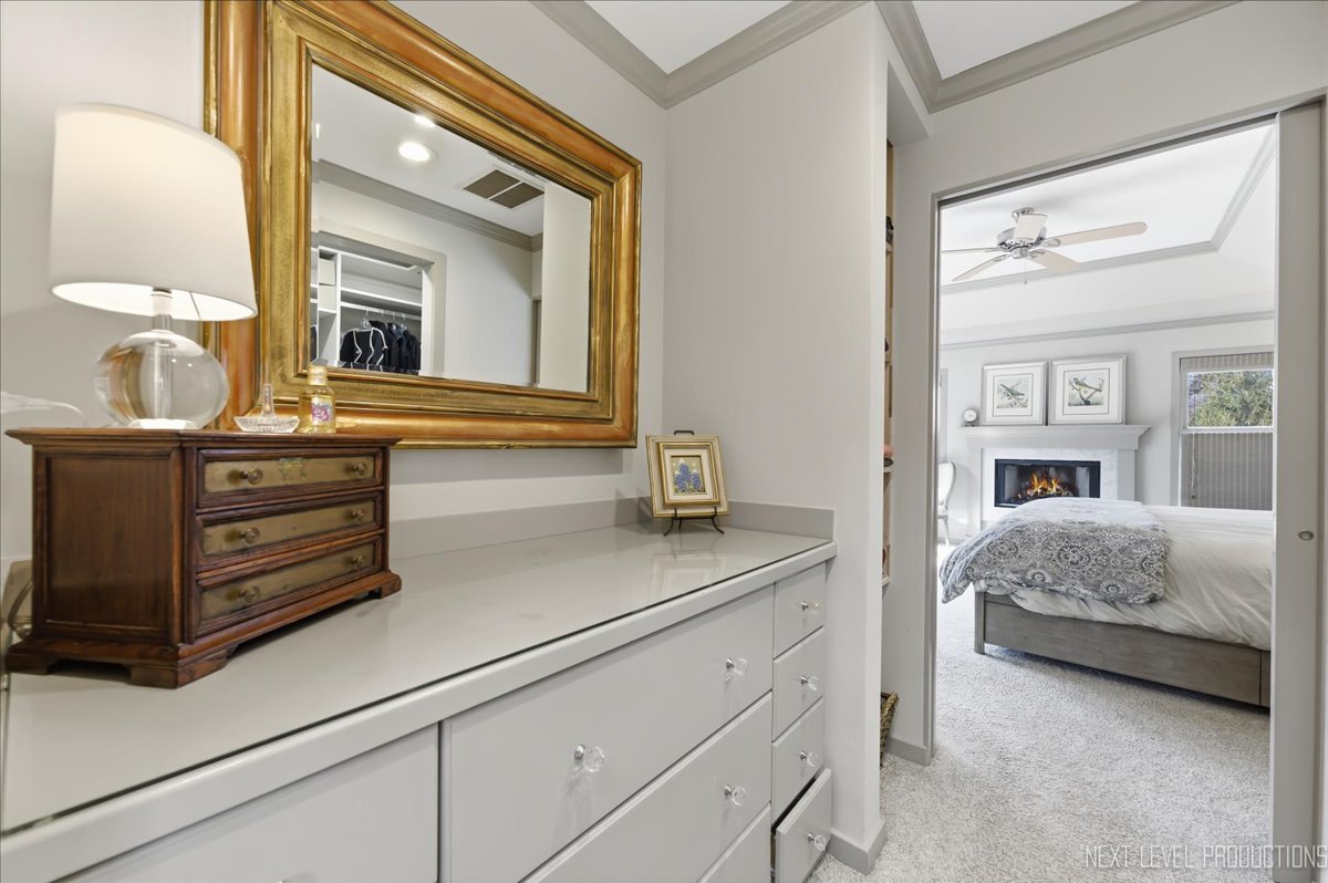 629 Peck Road Geneva, IL 60134 - Photo 22 of 38 a en suite bathroom with a granite countertop sink and a mirror