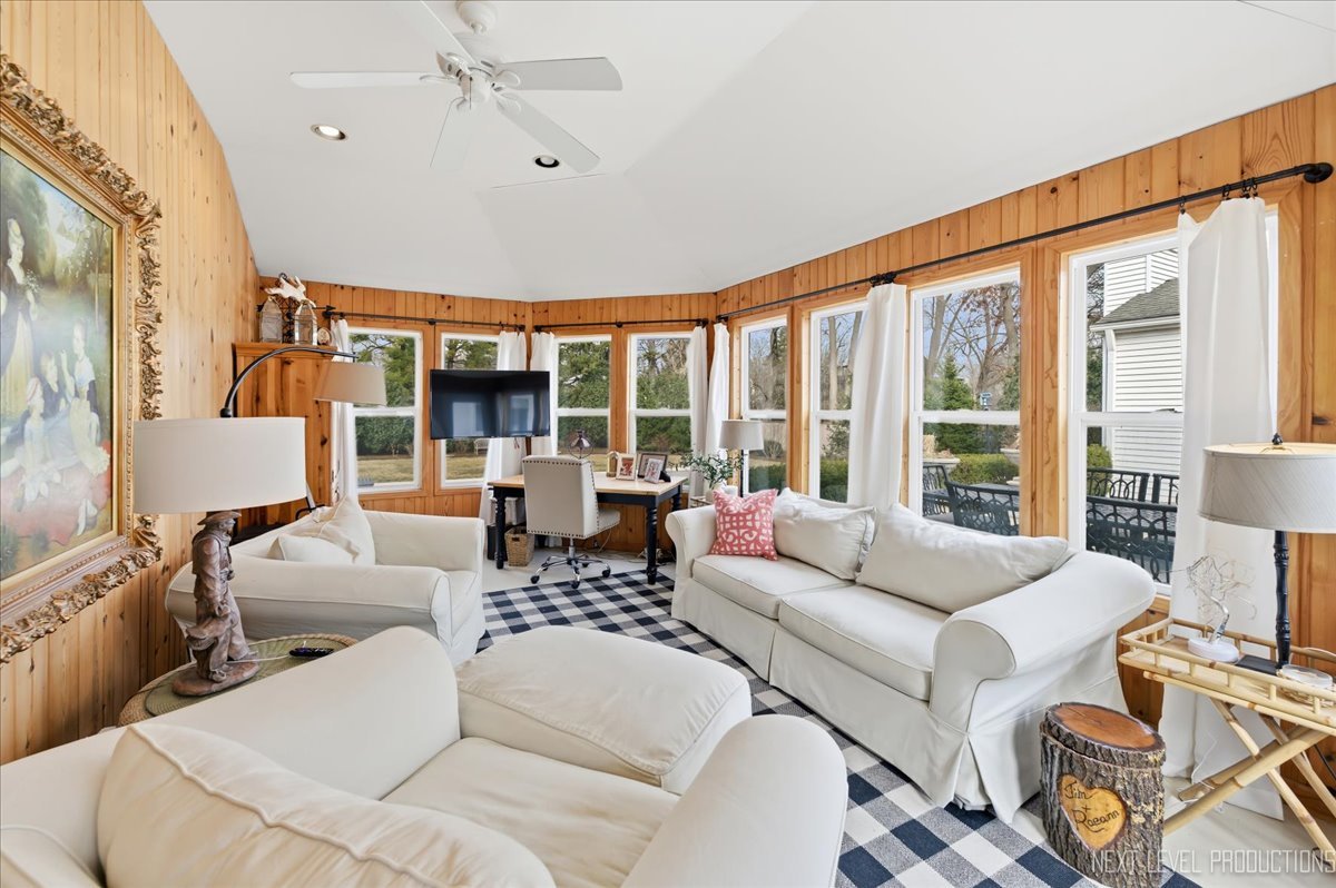 629 Peck Road Geneva, IL 60134 - Photo 31 of 38 a living room with furniture and a large window