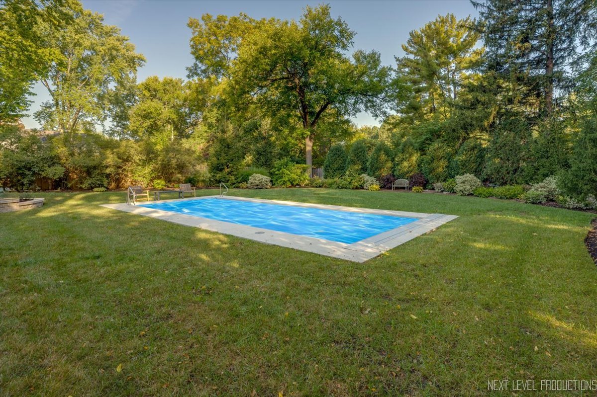 629 Peck Road Geneva, IL 60134 - Photo 35 of 38 a view of a field with trees in the background