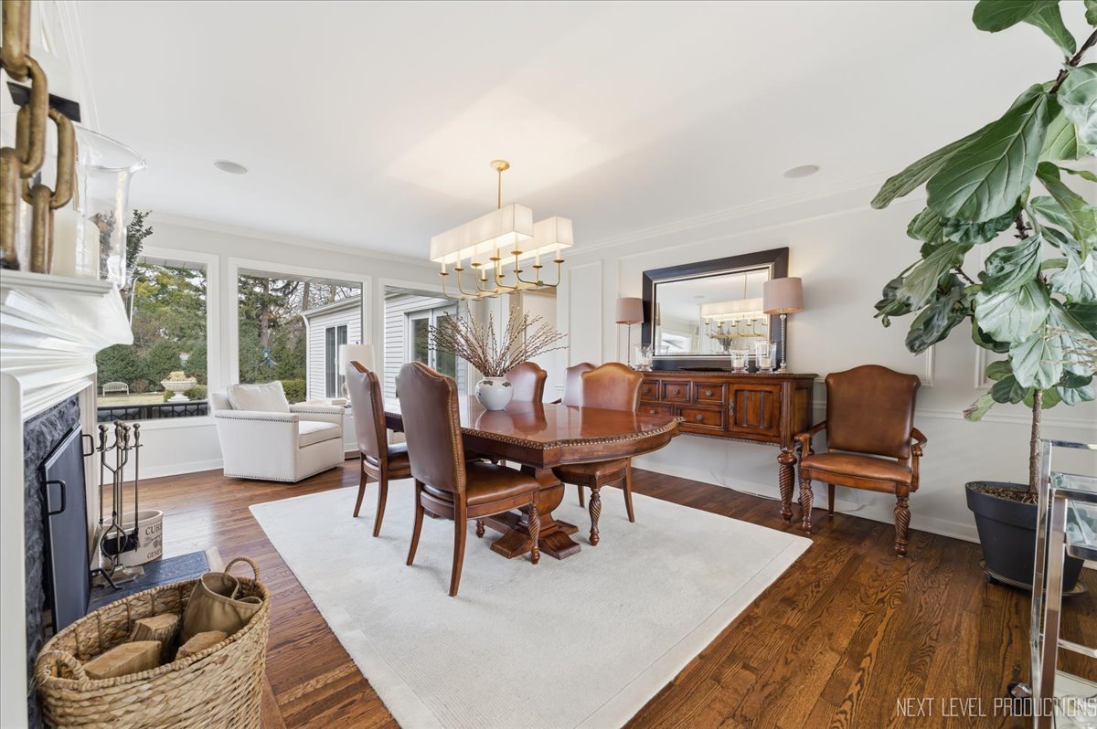 629 Peck Road Geneva, IL 60134 - Photo 5 of 38 a living room with furniture and a chandelier