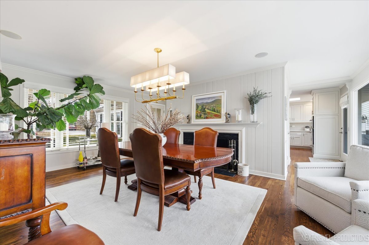 629 Peck Road Geneva, IL 60134 - Photo 6 of 38 a view of a dining room with furniture and chandelier