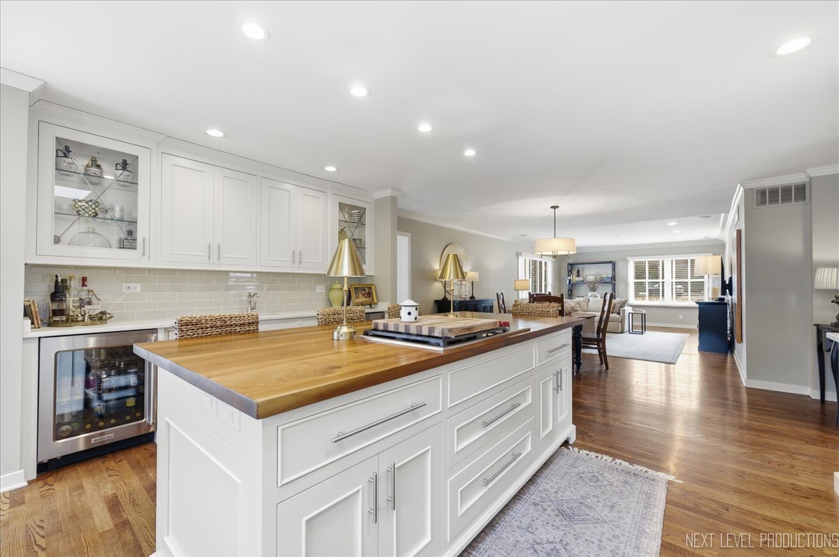 629 Peck Road Geneva, IL 60134 - Photo 9 of 38 a kitchen with a stove and cabinets