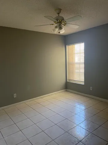 a bathroom with a toilet a sink and bathtub