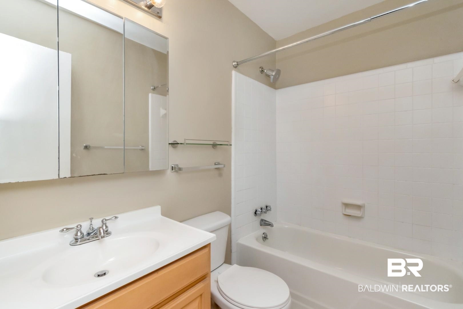 110 Du Rhu Drive, Unit E Mobile, AL 36608 - Photo 14 of 19 Bathroom with washtub / shower combination and vanity