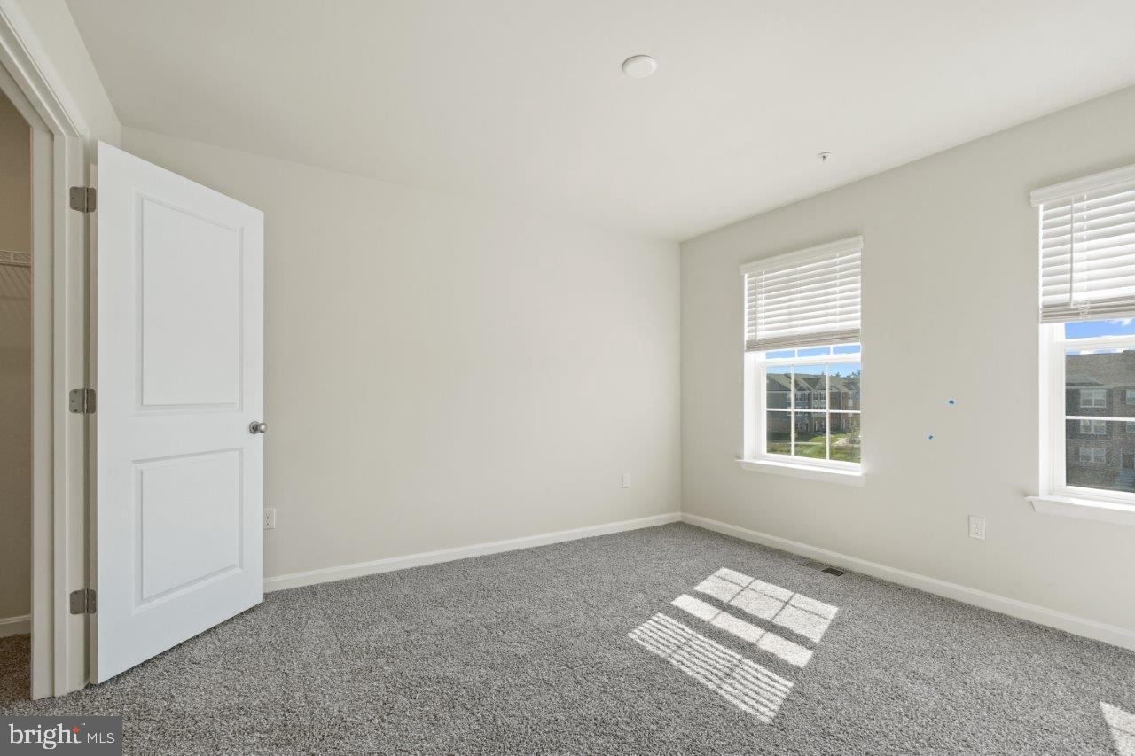 7519 Silver Thread Way Brandywine, MD 20613 - Photo 16 of 32 an empty room with windows