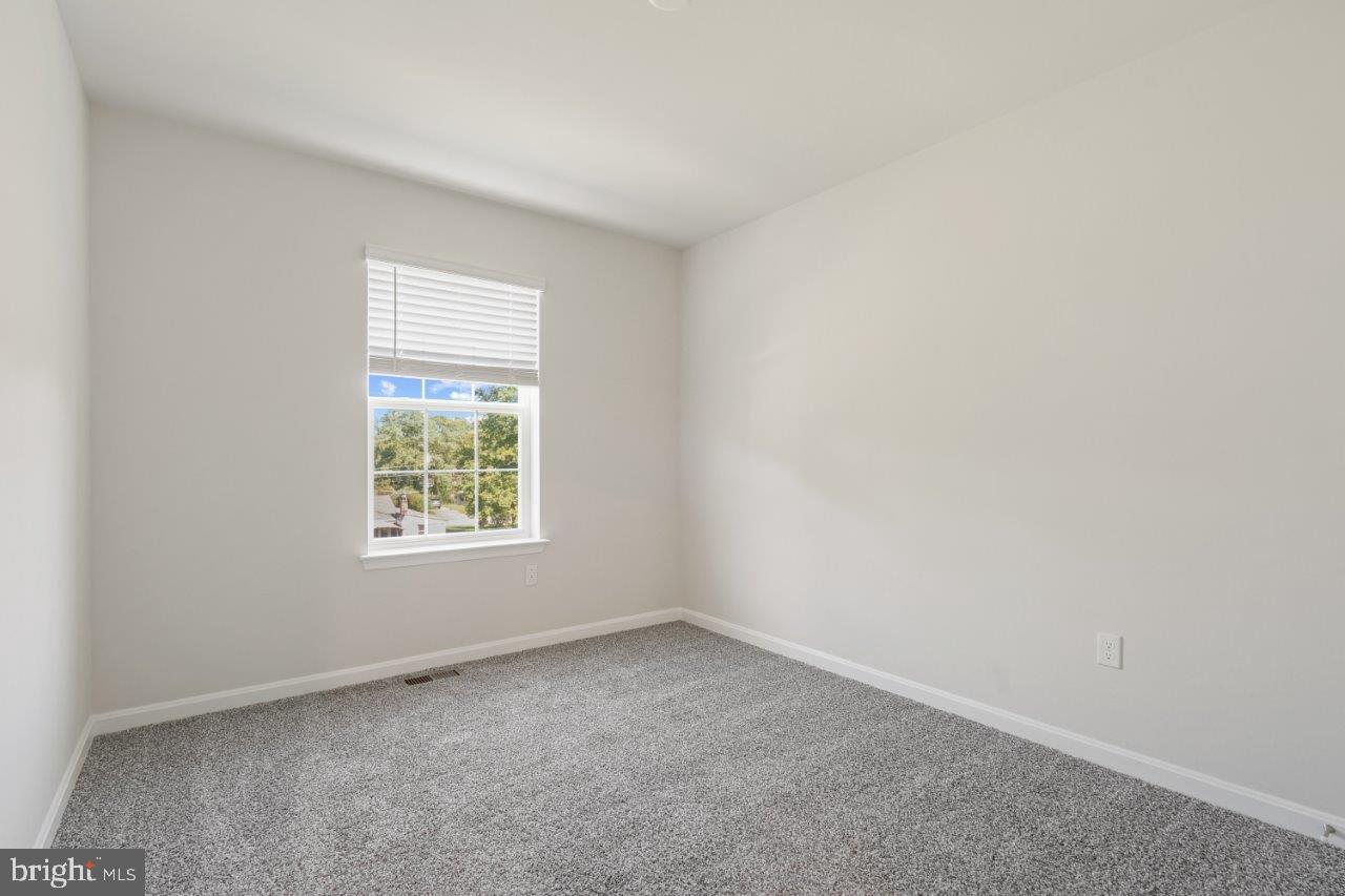 7519 Silver Thread Way Brandywine, MD 20613 - Photo 20 of 32 an empty room with a window
