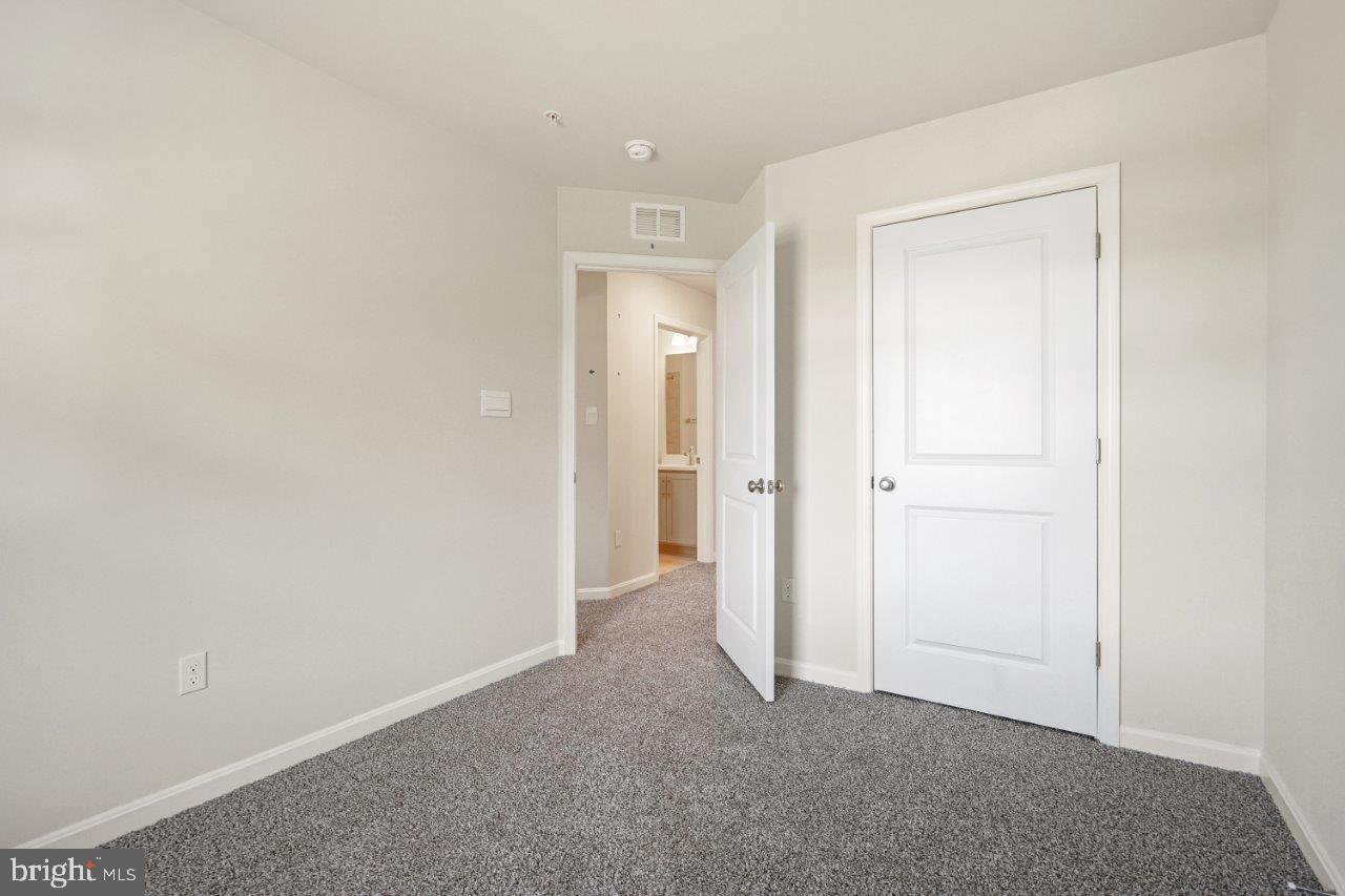 7519 Silver Thread Way Brandywine, MD 20613 - Photo 21 of 32 an empty room with closet and a bathroom