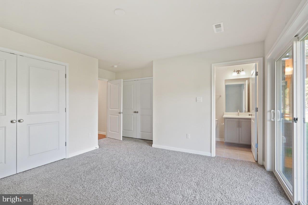 7519 Silver Thread Way Brandywine, MD 20613 - Photo 3 of 32 a view of an empty room and closet area