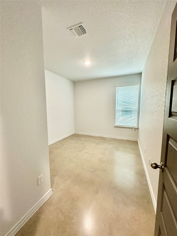 2321 Ocean Avenue, Unit B Temple, TX 76501 - Photo 11 of 19 an empty room with windows