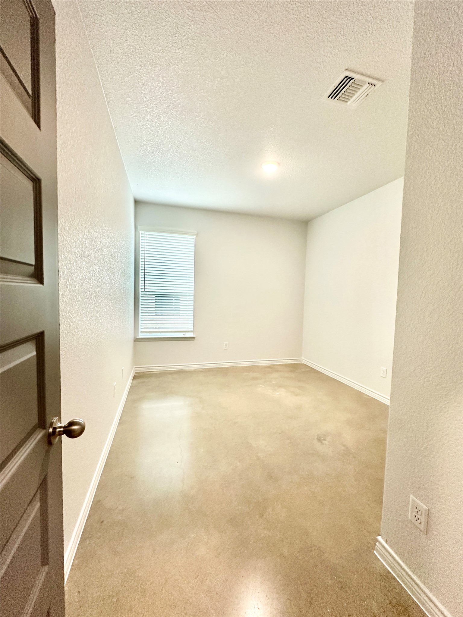 2321 Ocean Avenue, Unit B Temple, TX 76501 - Photo 13 of 19 an empty room with a windows