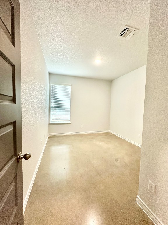 2321 Ocean Avenue, Unit B Temple, TX 76501 - Photo 13 of 19 an empty room with windows