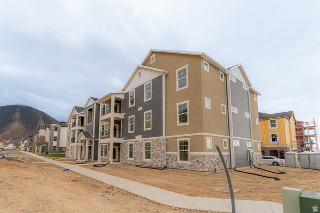 4655 South 720 West, Unit I303 Mapleton, UT 84664 - Photo 2 of 15 View of property featuring a residential view and a mountain view