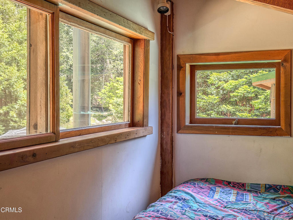 28680 Comptche Ukiah Road Comptche, CA 95427 - Photo 31 of 58 a bedroom with a bed and a window