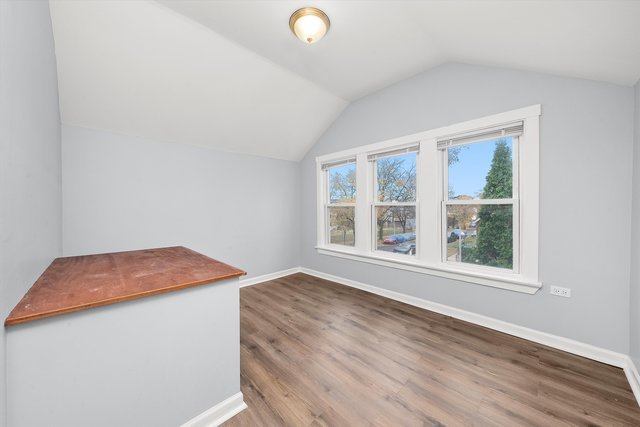 8100 South Houston Avenue Chicago, IL 60617 - Photo 19 of 55 an empty room with a window