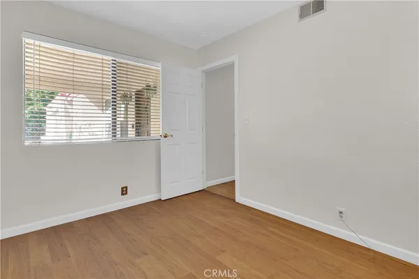 a picture of a bathroom with a shower