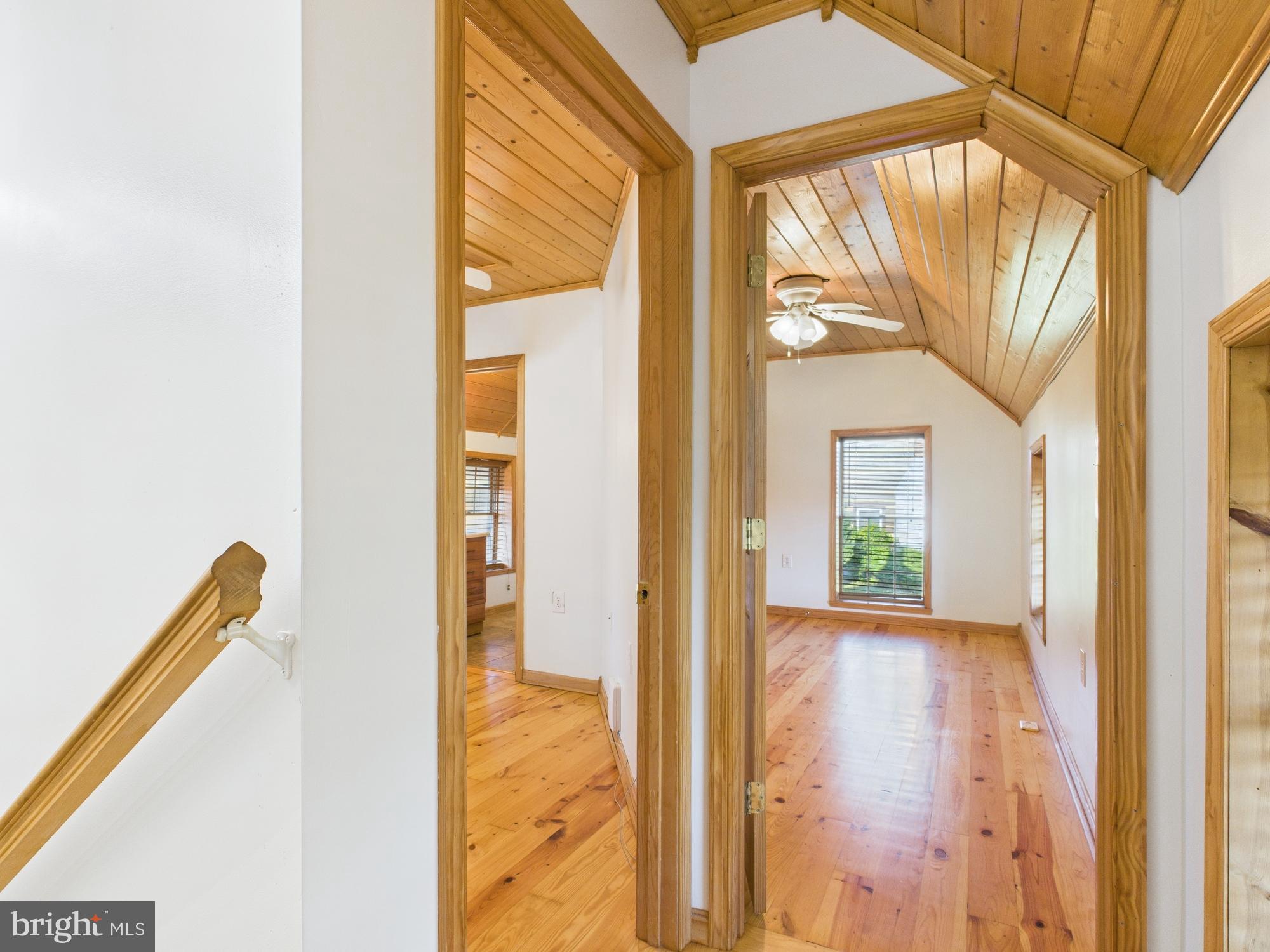 36 Runnymeade Road Bunker Hill, WV 25413 - Photo 25 of 45 Inviting hallway with warm wooden accents.
