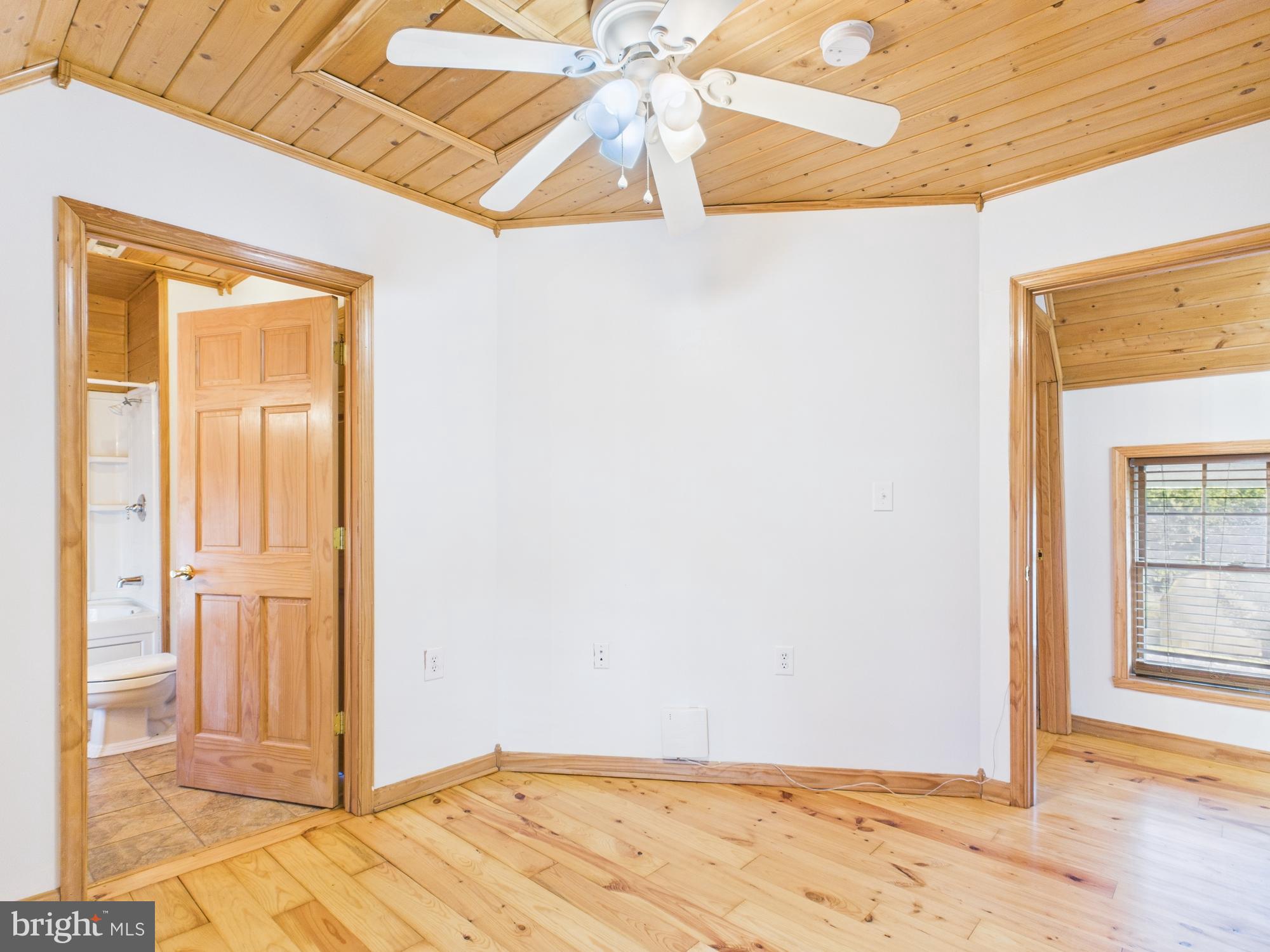 36 Runnymeade Road Bunker Hill, WV 25413 - Photo 27 of 45 Bright, airy space with natural wood accents.