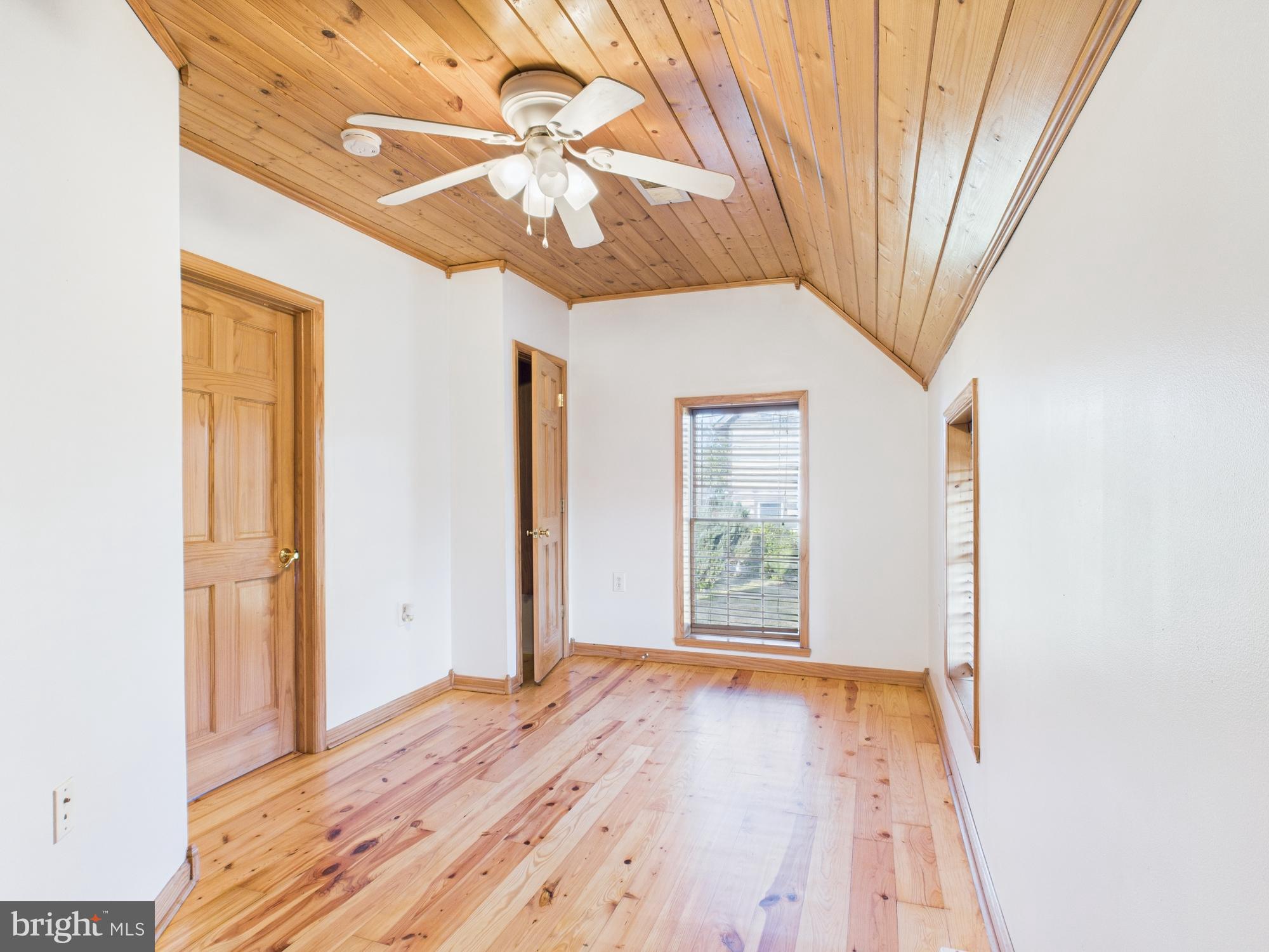 36 Runnymeade Road Bunker Hill, WV 25413 - Photo 31 of 45 Bright, airy room with wooden accents.