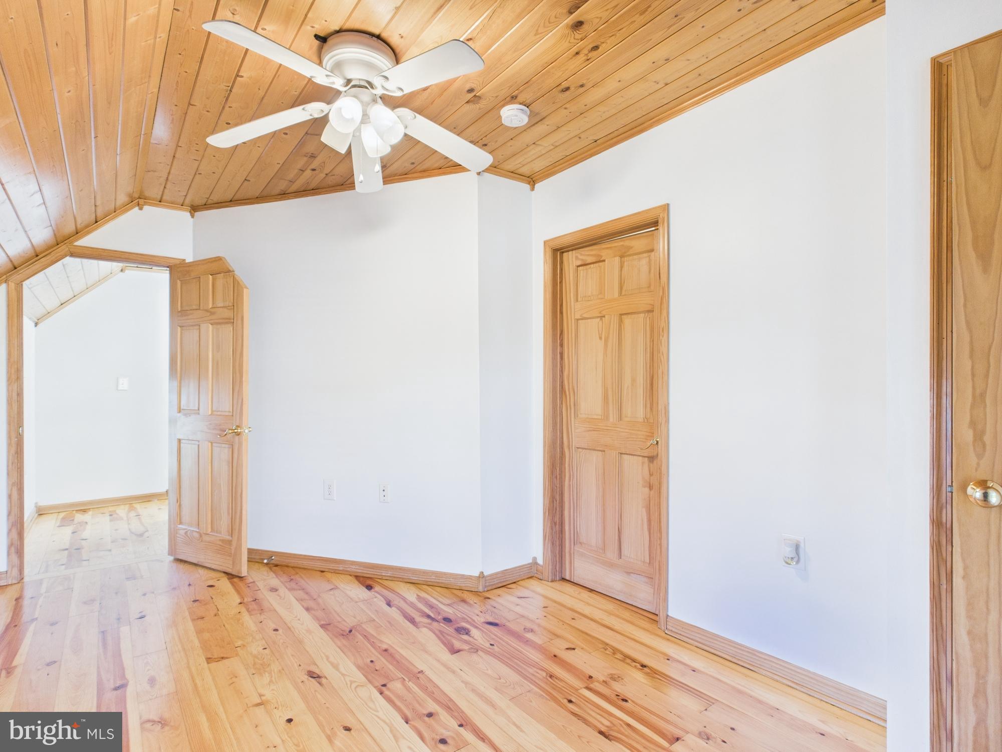 36 Runnymeade Road Bunker Hill, WV 25413 - Photo 32 of 45 Bright, airy space with natural wood accents.