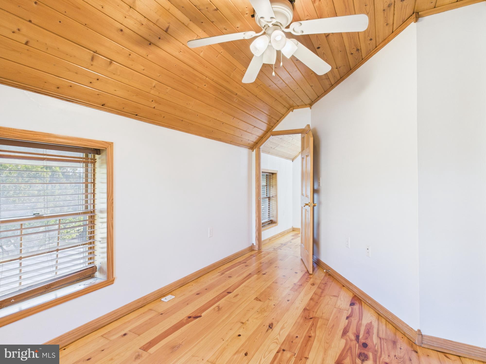 36 Runnymeade Road Bunker Hill, WV 25413 - Photo 33 of 45 Cozy room with natural wood accents.