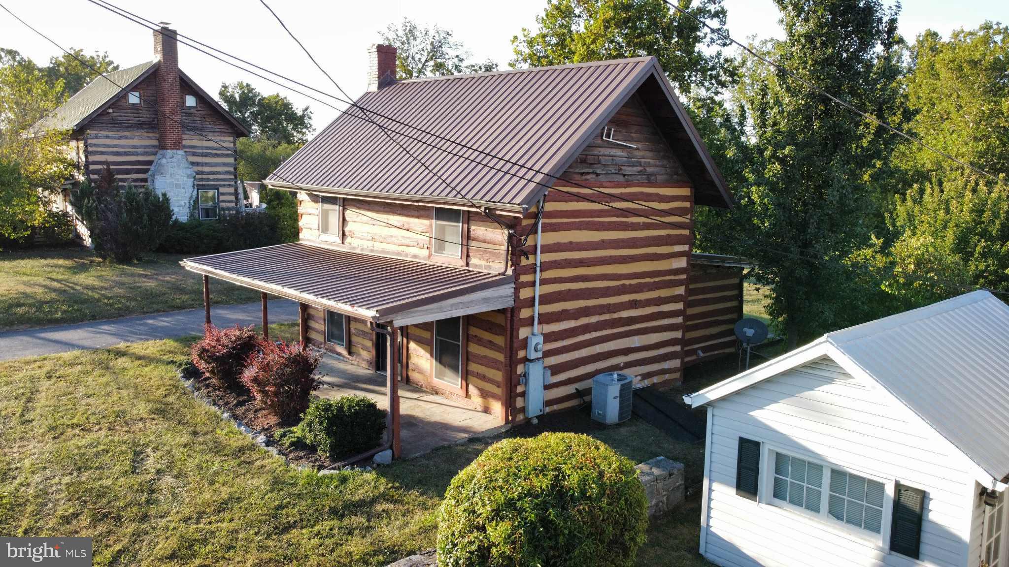 36 Runnymeade Road Bunker Hill, WV 25413 - Photo 38 of 45 Charming log home with lush surroundings.