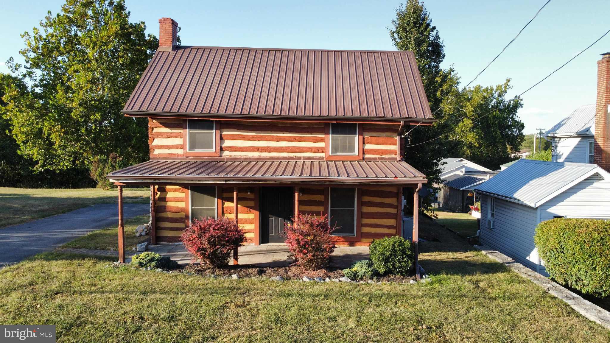 36 Runnymeade Road Bunker Hill, WV 25413 - Photo 39 of 45 Charming log cabin with modern touches.