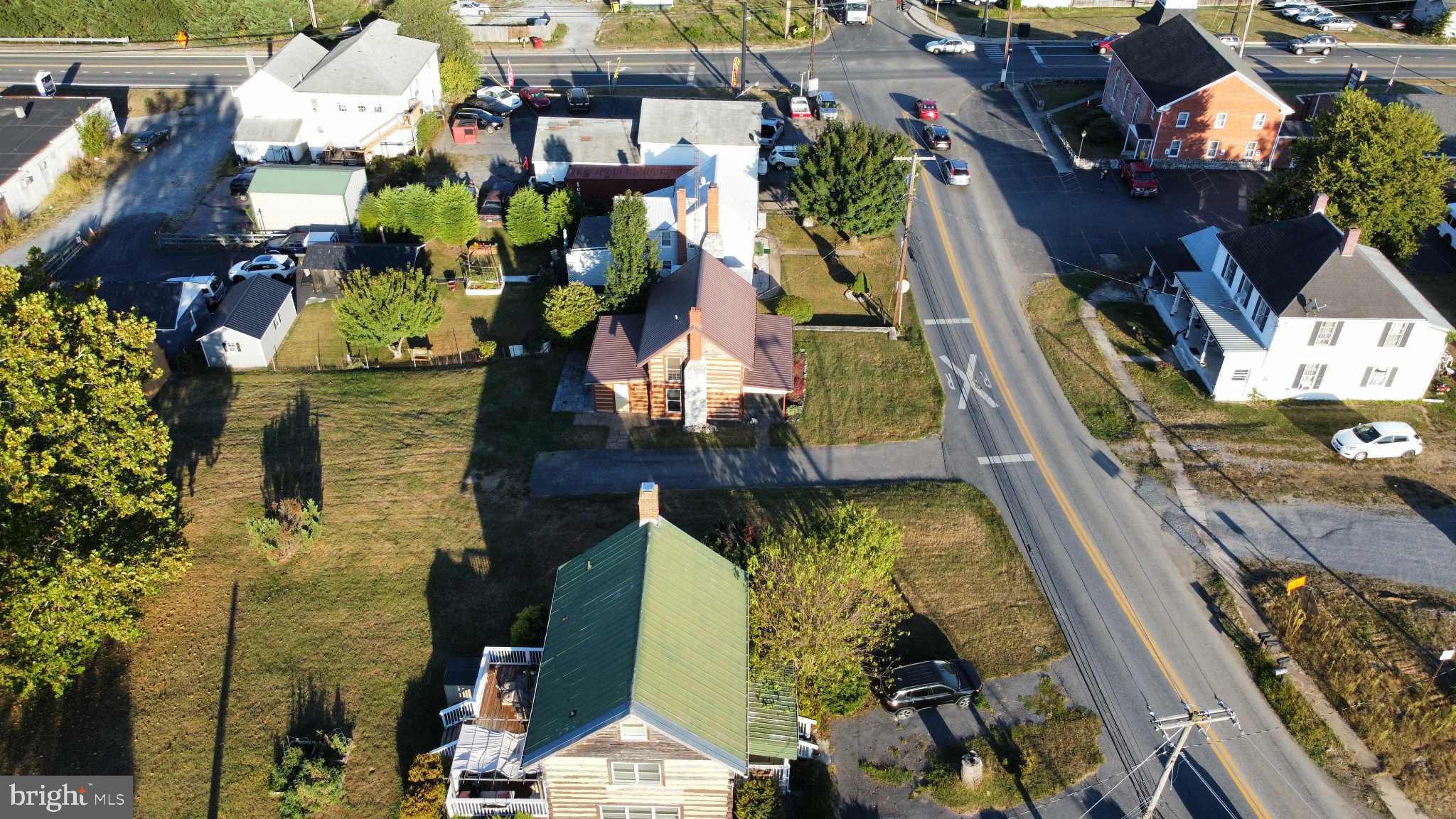36 Runnymeade Road Bunker Hill, WV 25413 - Photo 41 of 45 Charming neighborhood with lush greenery.