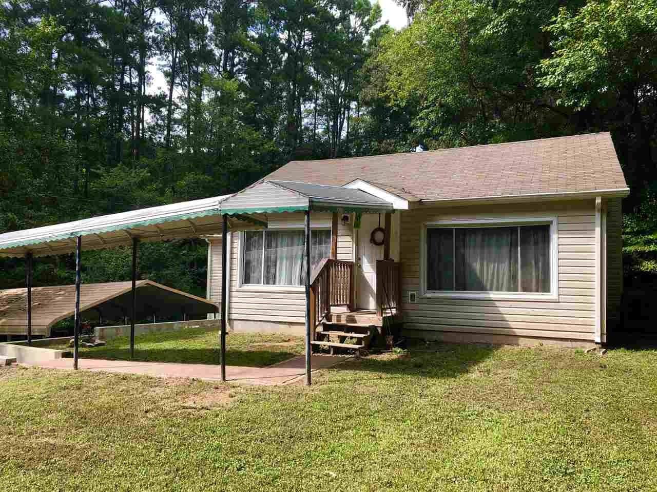 2000 Old River Road Charleston, TN 37310 - Photo 2 of 9 a view of a house with backyard