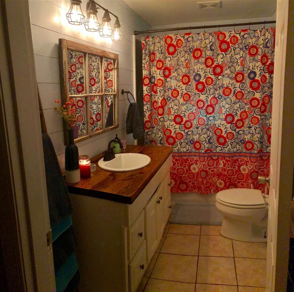 2000 Old River Road Charleston, TN 37310 - Photo 6 of 9 a bathroom with a sink and a toilet