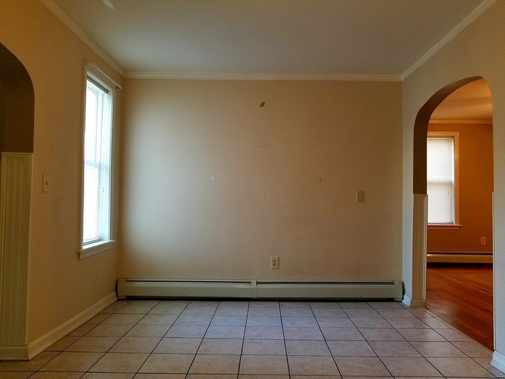126 Ridge Street Fall River, MA 02721 - Photo 11 of 28 a view of empty room with window