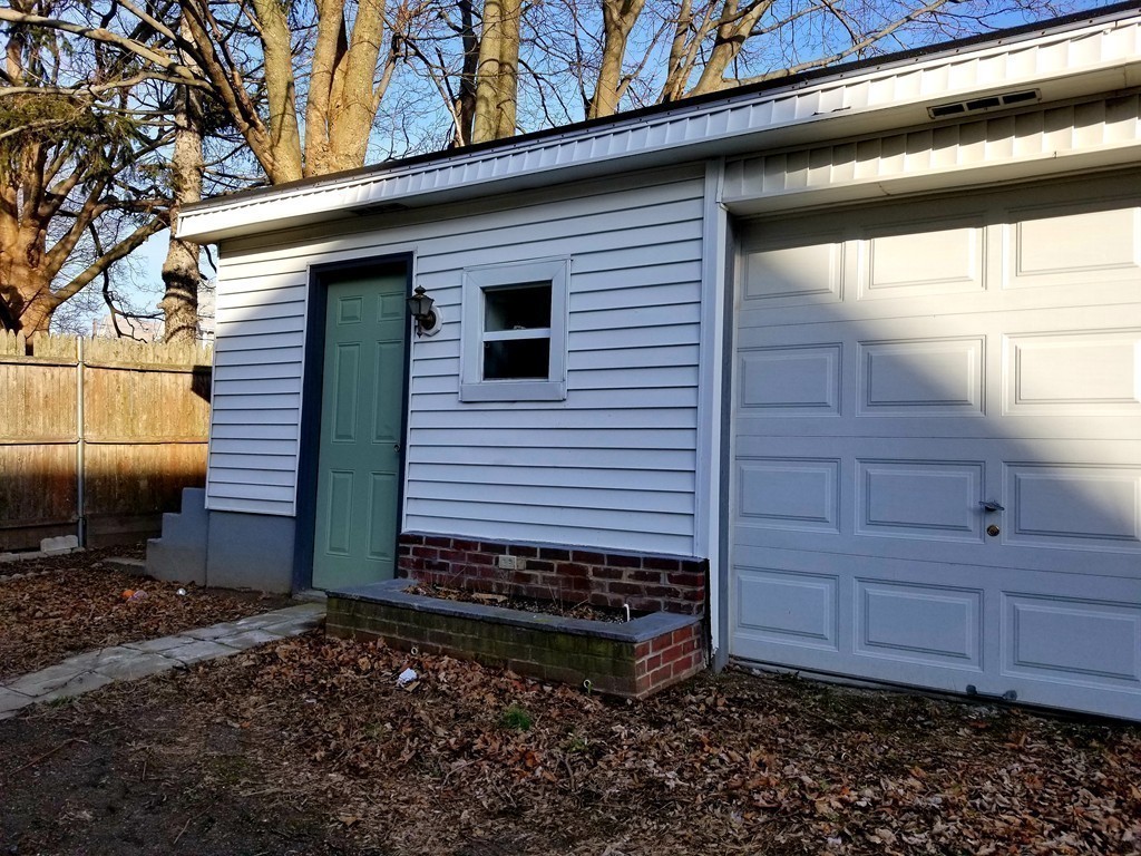 126 Ridge Street Fall River, MA 02721 - Photo 28 of 28 a view of a house with a yard