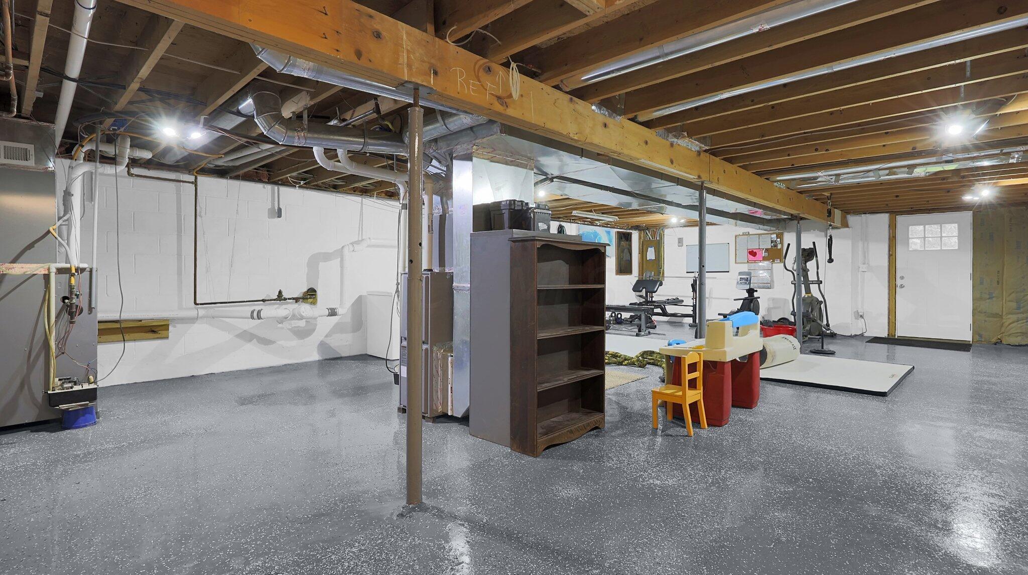 7790 Schott Road Westerville, OH 43081 - Photo 36 of 50 The basement must not be forgotten. With epoxy flooring this clean and tidy space is perfect for your home gym, workshop, storage and more!