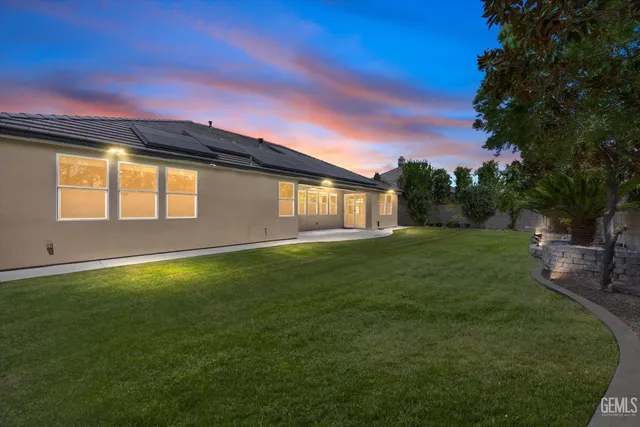 a front view of house with outdoor space and yard