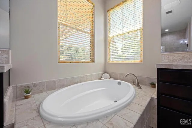 a bathroom with a sink and a bathtub
