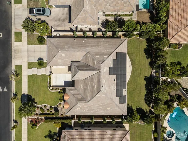 an aerial view of multiple houses with outdoor space