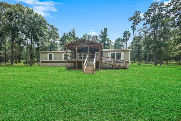 $650,000 | 577 Winding River Road South, Oakhurst, TX 77359
