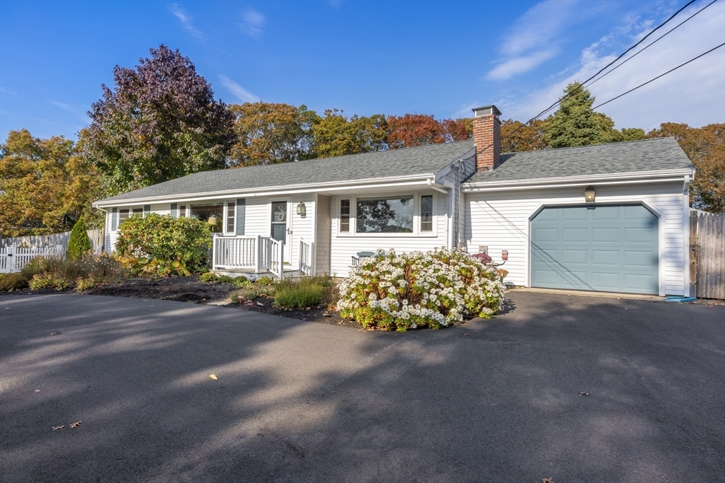 80 Sterling Road Barnstable, MA 02601 - Photo 1 of 19 a front view of a house with garden
