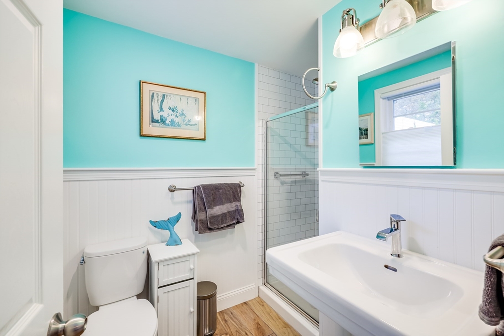 80 Sterling Road Barnstable, MA 02601 - Photo 12 of 19 a bathroom with a sink mirror and toilet