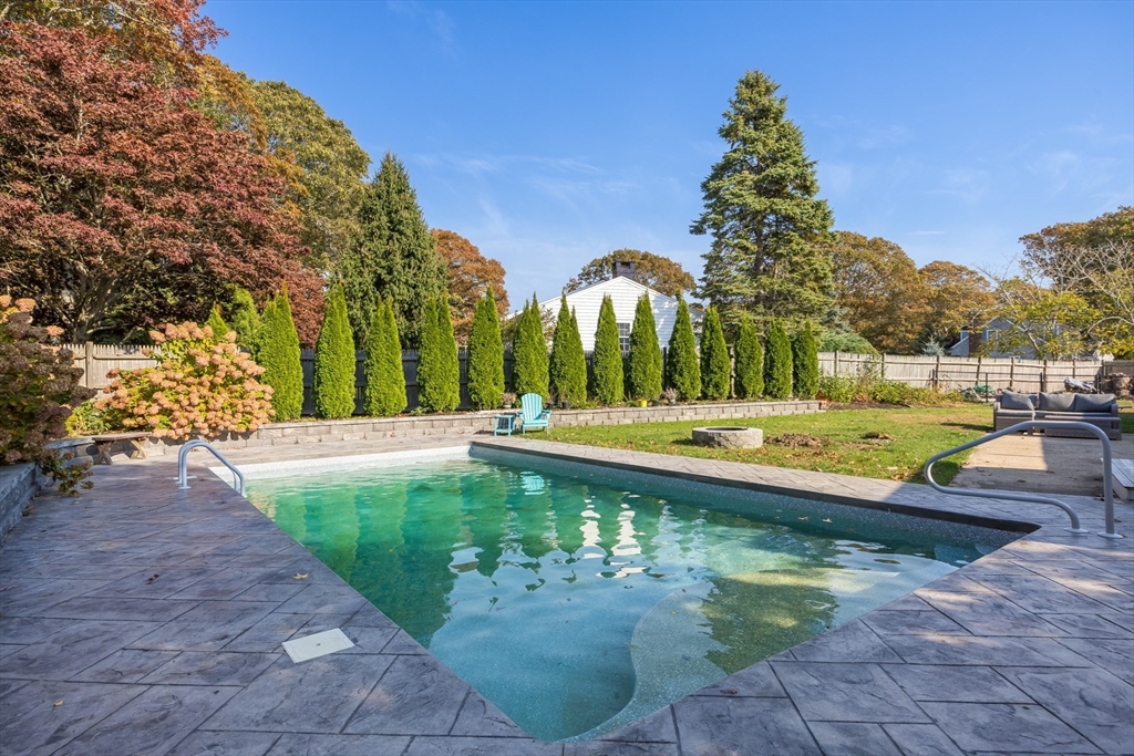 80 Sterling Road Barnstable, MA 02601 - Photo 3 of 19 a view of swimming pool with a yard