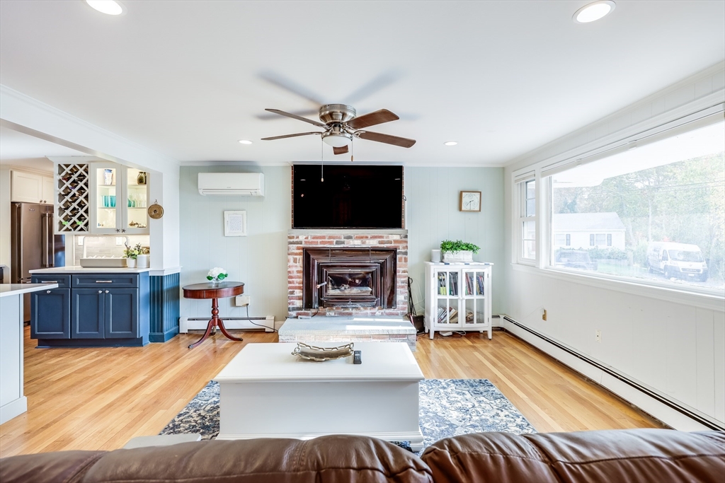 80 Sterling Road Barnstable, MA 02601 - Photo 4 of 19 a living room with furniture fireplace and flat screen tv