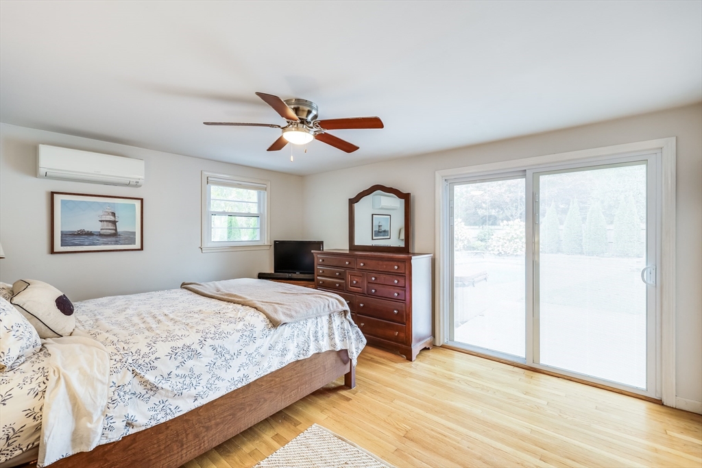80 Sterling Road Barnstable, MA 02601 - Photo 10 of 19 a bedroom with a large bed and a window