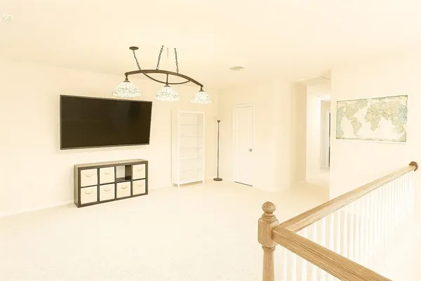 a view of a living room and a window