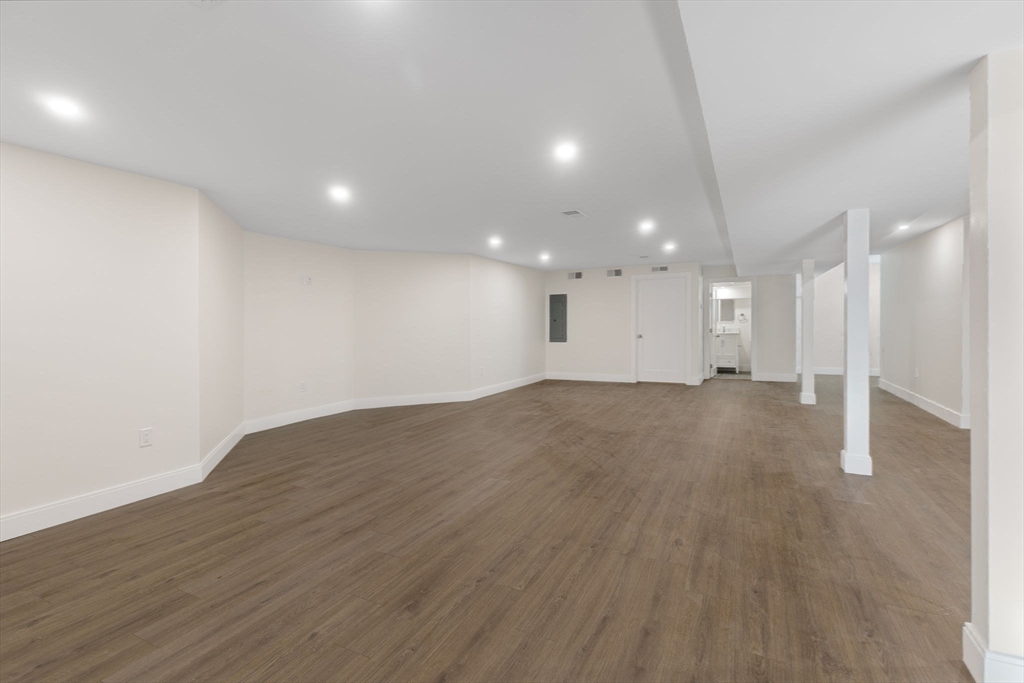 1864 River Street Boston, MA 02136 - Photo 18 of 38 a view of a room with wooden floor and window