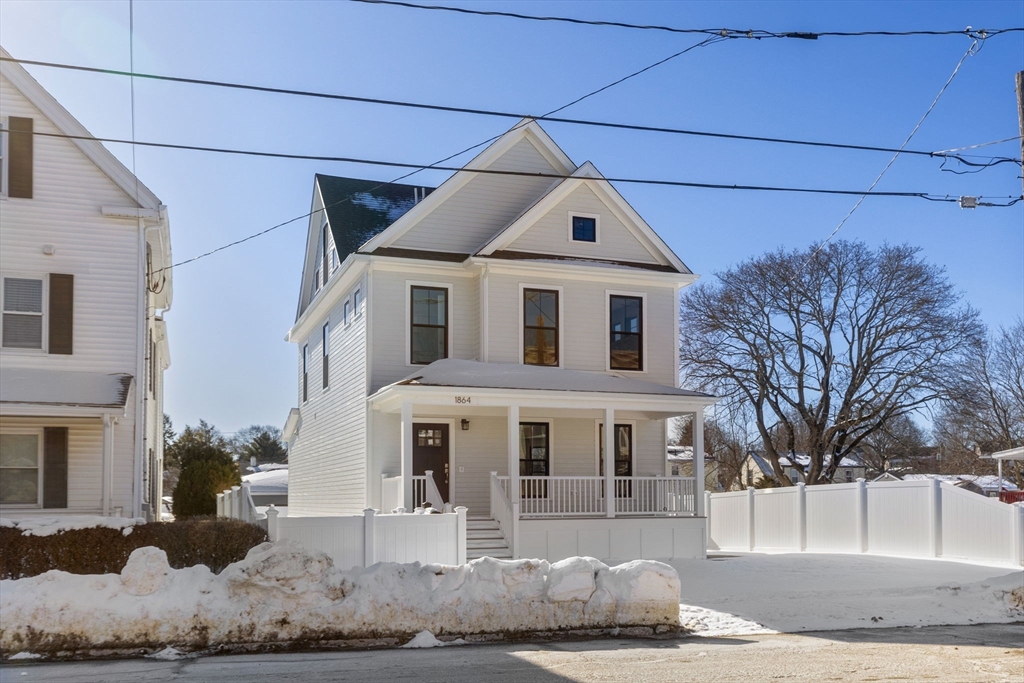 1864 River Street Boston, MA 02136 - Photo 2 of 38 a front view of a house with a yard