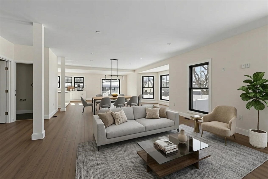 1864 River Street Boston, MA 02136 - Photo 5 of 38 a living room with furniture or couch and a wooden floor