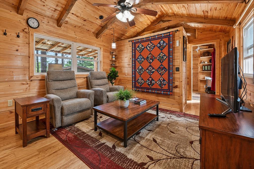 57 Meadow Hill Morganton, GA 30560 - Photo 15 of 59 a living room with furniture a rug and a window