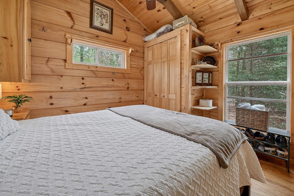 57 Meadow Hill Morganton, GA 30560 - Photo 23 of 59 a bedroom with a bed and a window