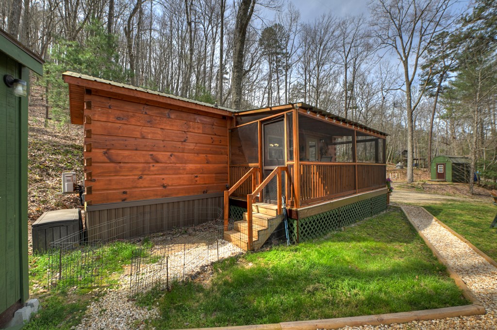 57 Meadow Hill Morganton, GA 30560 - Photo 39 of 59 a view of a small house with a yard